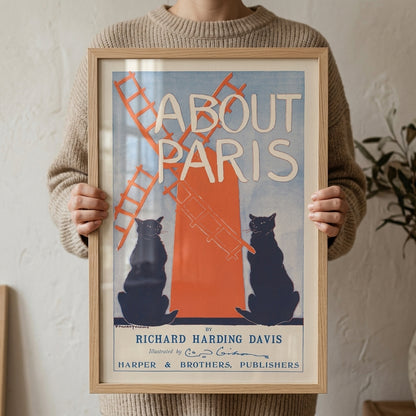Framed About Paris vintage print held to demonstrate scale and home display